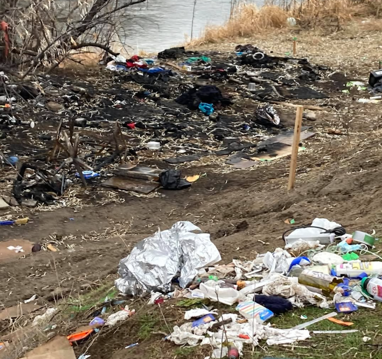 Garbage left at an encampment on a riverbed in Penticton.